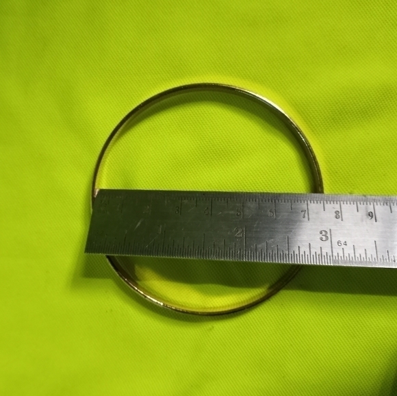 Goldtone polished finish flat Bangle bracelet large - Picture 2 of 3